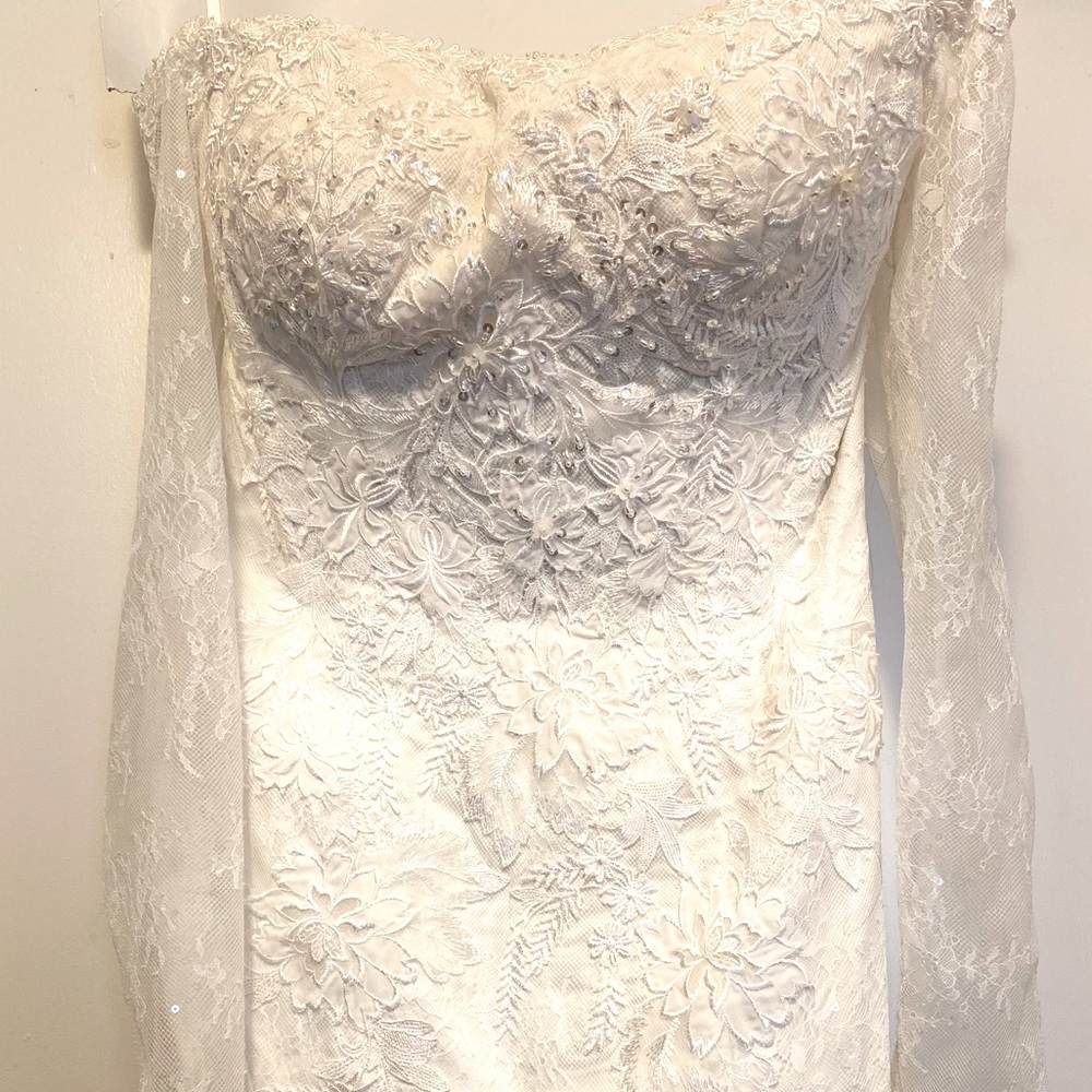 Beautiful size 4 wedding dress by David’s Bridal